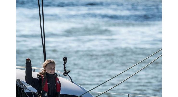 Greta Thunberg sails into Lisbon en route to COP25
