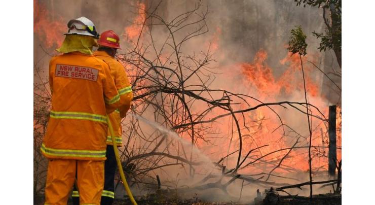 'Mega fire' forms north of Sydney
