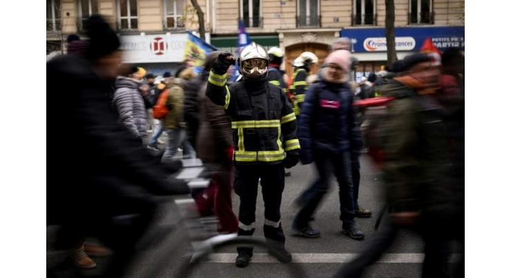 French government sticks by pension reform as strike bites
