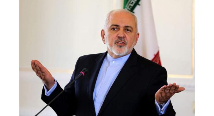 Zarif says Iranian, American to 'join families' in apparent swap
