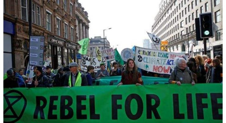 Extinction Rebellion Climate Activists Stage Air Pollution Protests in UK Cities