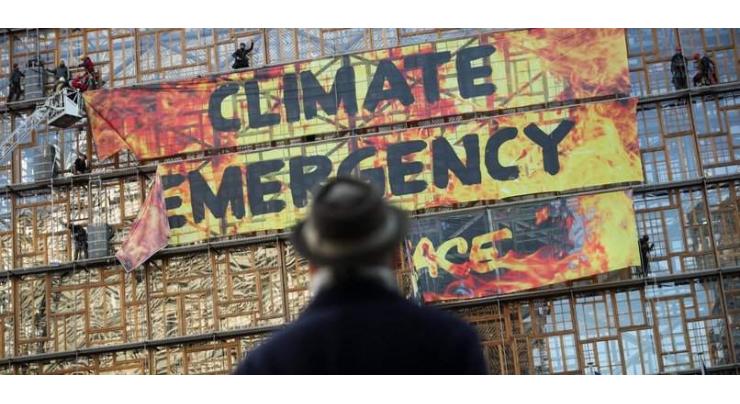 Climate activists protest new plans amid EU summit
