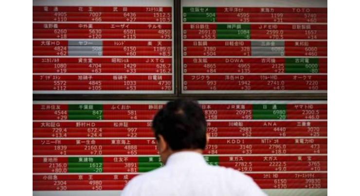 Tokyo stocks close sharply higher on Wall Street's lead, British election outcome
