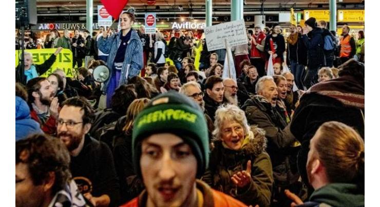 Dutch police arrest climate protesters at Schiphol
