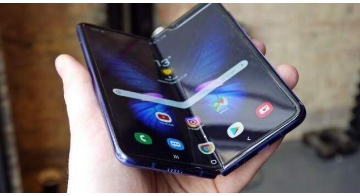 Samsung to launch 'clamshell' foldable phone in Feb.
