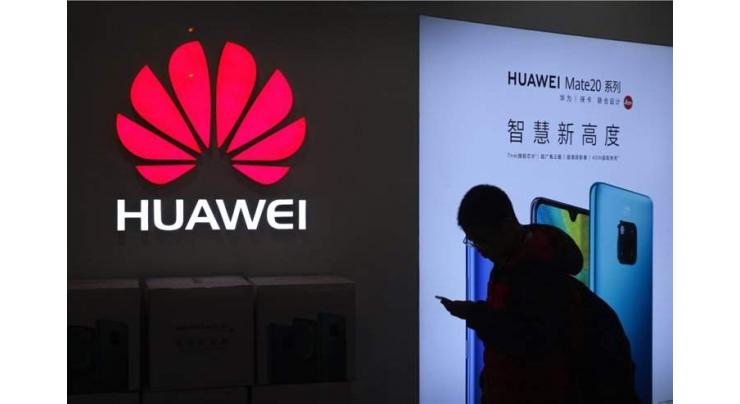 China's Huawei says 'survival first priority' after 2019 sales fall short
