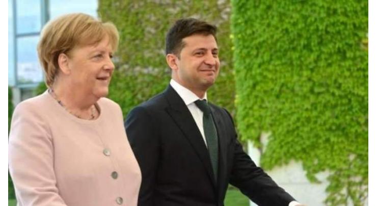 Zelenskyy Tells Merkel by Phone Work Under Way to Form New Lists for Donbas Prisoner Swap