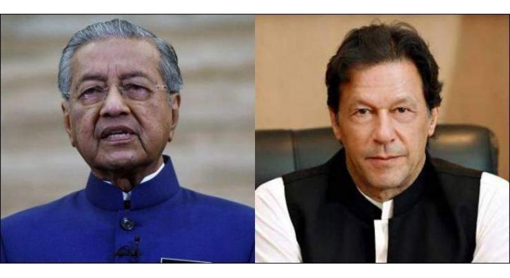 Startlingly similar challenges for Mahathir, Imran govts need akin actions, closer cooperation
