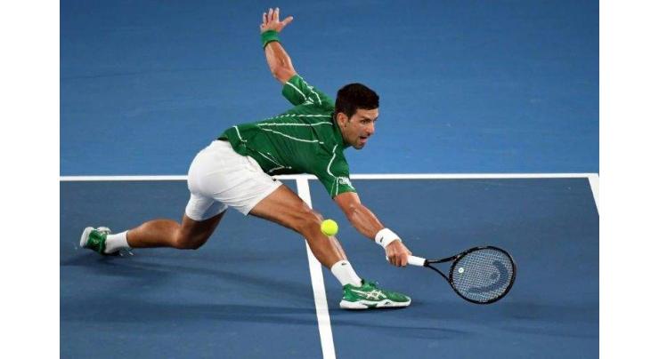 Djokovic survives scare in tough Slam opener
