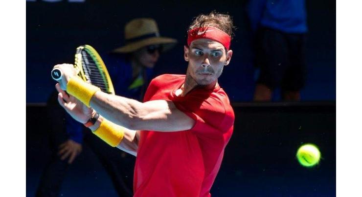 Nadal aims to keep heat on Federer Slams record
