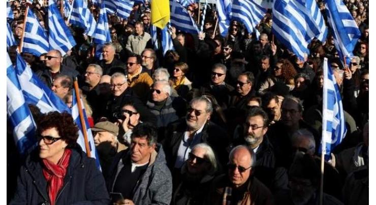 Thousands of Greek islanders protest against migrant camps
