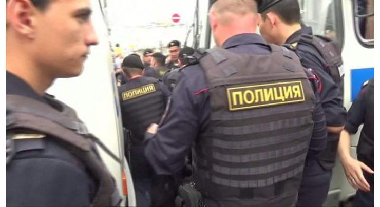 Russia detains ex-policemen over reporter's drug arrest
