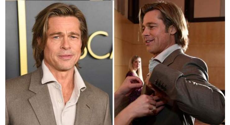 Brad Pitt wears his name tag at Oscars luncheon and gets applauded on the internet
