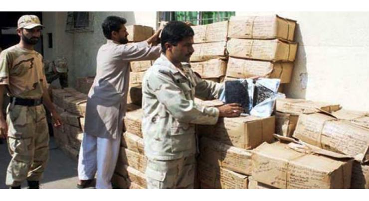 30Kg hashish, 9Kg opium recovered, smuggler arrested
