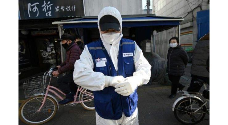 Seoul bears brunt as Asia markets plunge on pandemic worries
