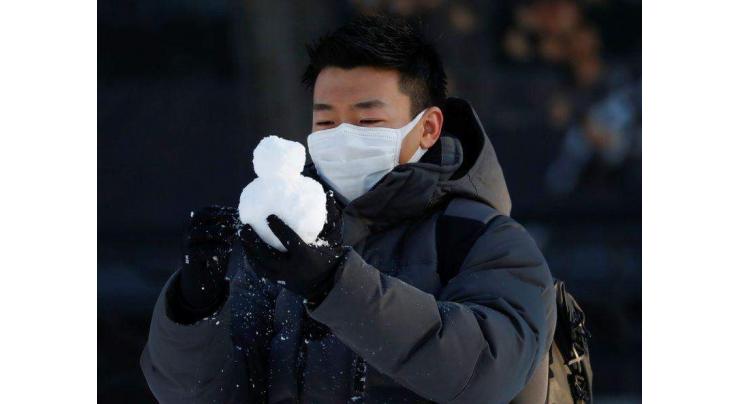 Japan's Hokkaido region urges people to stay home over virus fears
