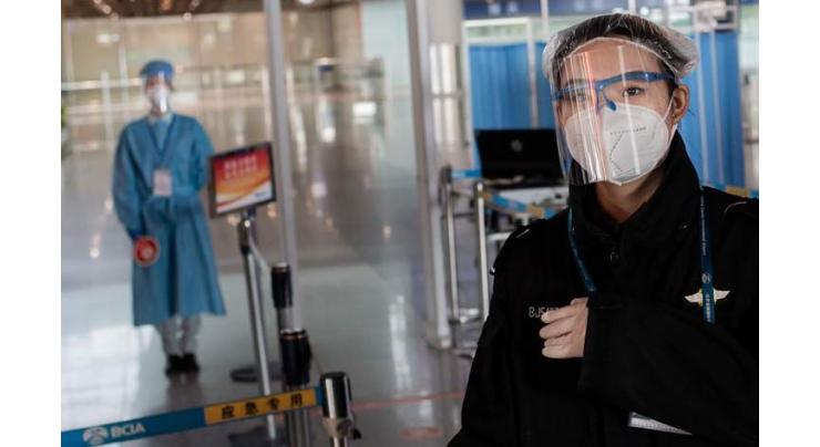 China tightens quarantine for international arrivals
