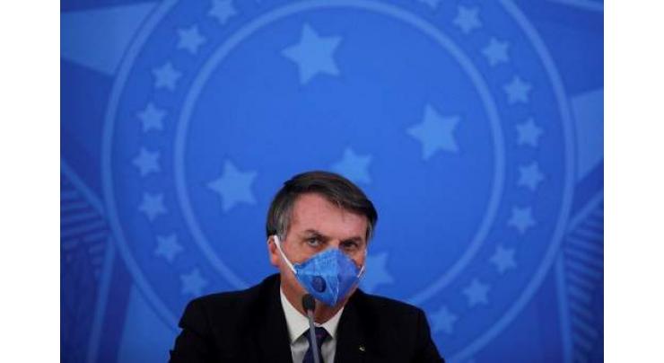 Twitter removes two Bolsonaro tweets questioning virus quarantine

