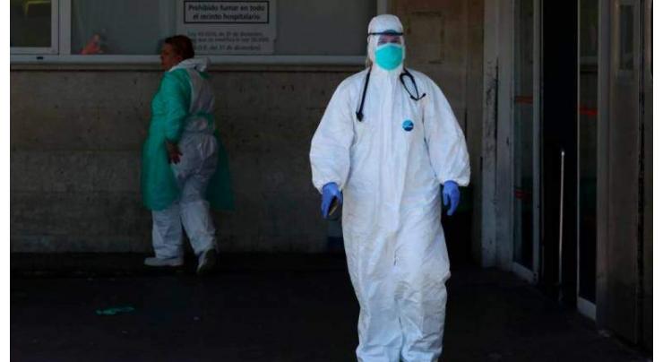 Spain announces 812 virus deaths in 24 hours, slight drop

