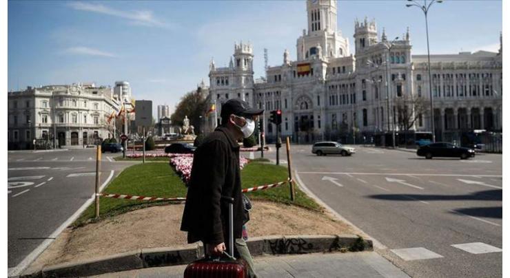 Spain sees 950 daily deaths from virus, unemployment soars
