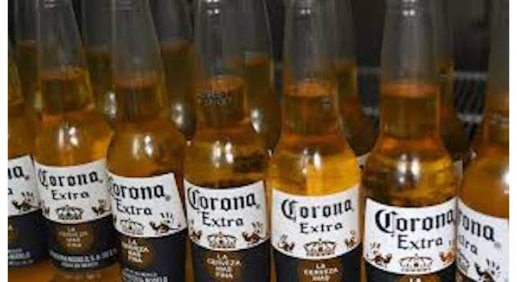 Corona beer producer halts brewing over virus
