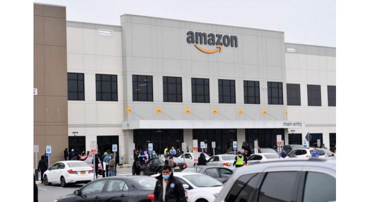Temperature checks, masks new norm for Amazon employees
