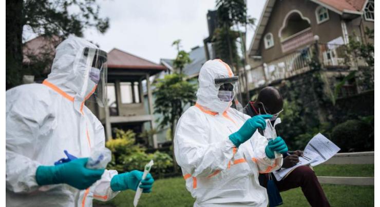 DR Congo confines, disinfects business district to fight virus
