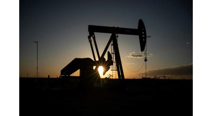 With prices down and jobs leaving, US oil workers learn patience
