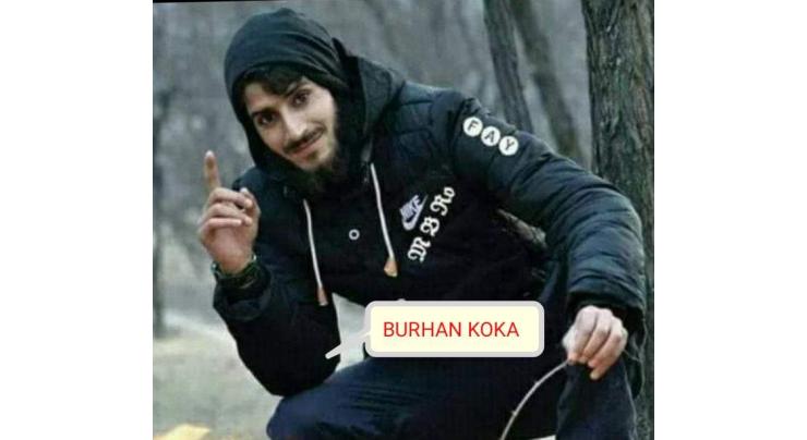 Family visits grave of Burhan Koka after a month in IOK
