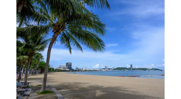 Thais seek sun and surf as officials re-open some beaches
