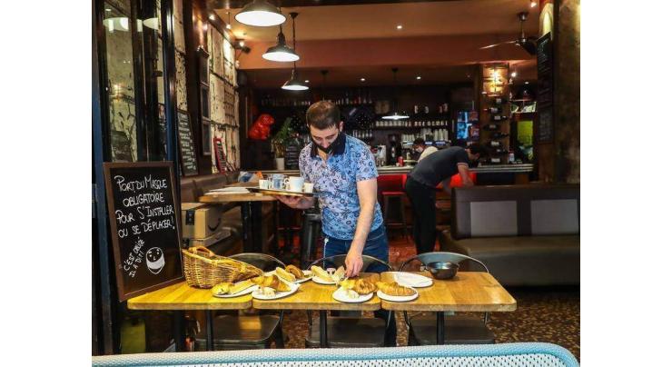 France savours the return of its iconic cafes and restaurants
