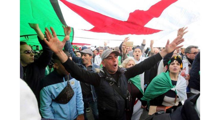Algeria to pardon two jailed protest leaders: political source
