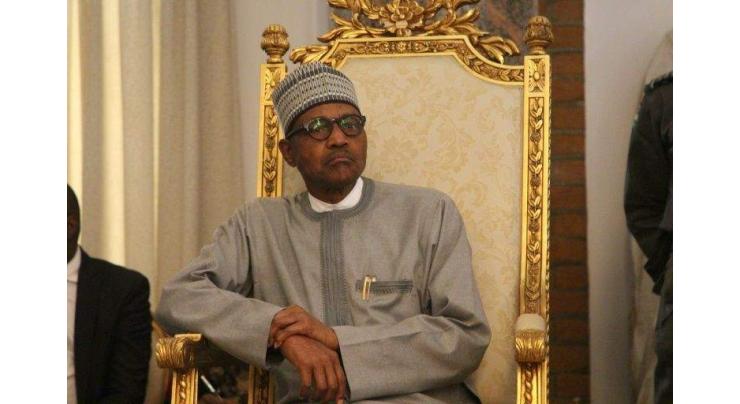 Nigeria's Buhari backs Africa bank head despite US demands
