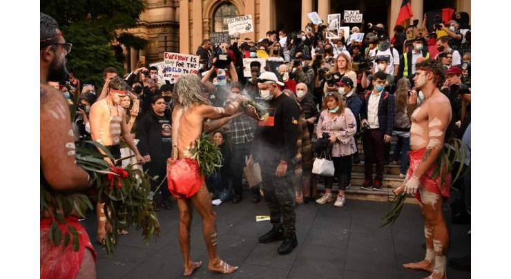 Defiant Australians protest racial injustice despite warnings
