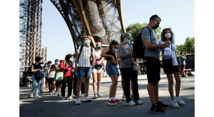 'Tears of joy': Eiffel Tower opens after 104-day virus lockdown
