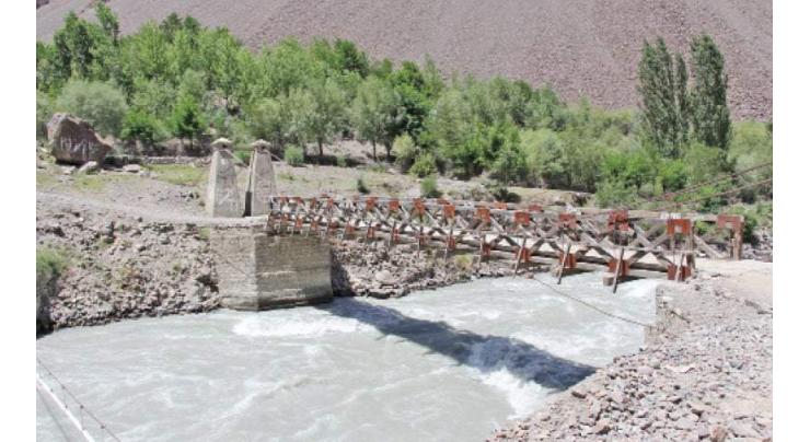 Work on dilapidated old bridge on River Chitral begins
