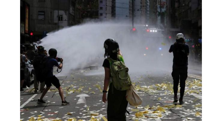 Hong Kong Police Use Water Canons to Disperse Protests Against New Security Law - Reports