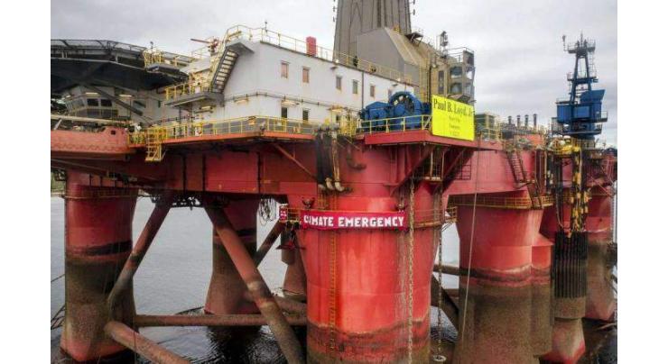 UK court fines Greenpeace over BP oil rig protest
