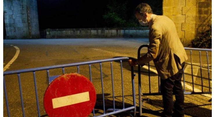 Catalonia places 200,000 people under coronavirus lockdown
