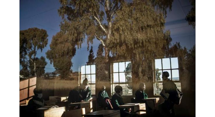 S.African pupils miss meals as virus limits school return
