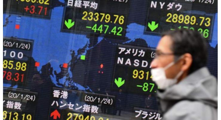Asian markets tumble as infection rates jump
