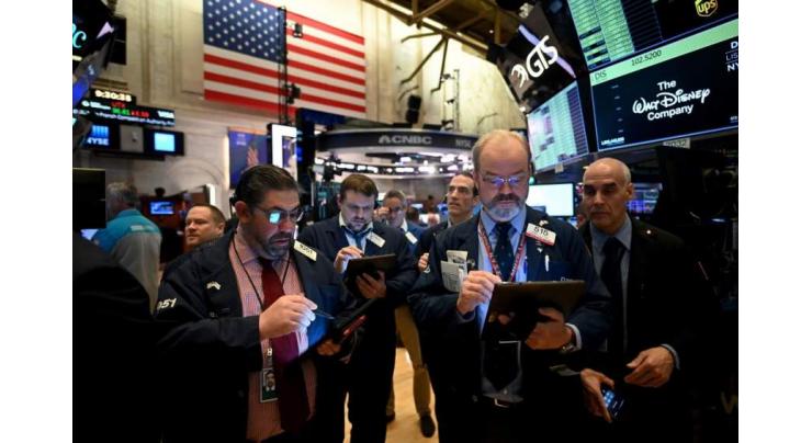 US stocks mostly up but volatile amid COVID-19 worries
