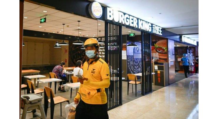 Burger King apologises over expired food sold in China
