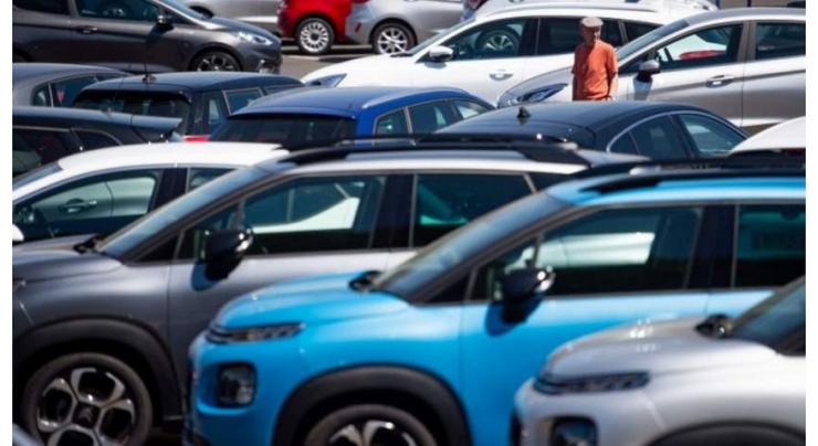 UK car dealer axes 1,800 jobs as virus slams sector
