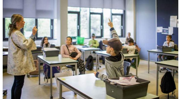Romania to re-open schools despite virus spike

