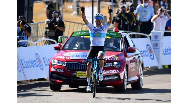 Lutsenko wins Tour de France stage six after long breakaway
