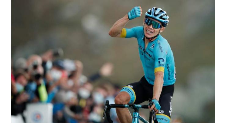 Colombia's Lopez wins on Tour summit, Roglic extends lead
