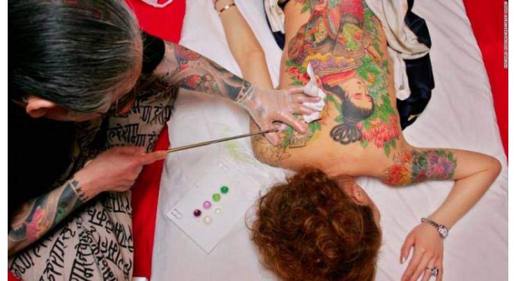 Japan top court sides with tattoo artist in test case
