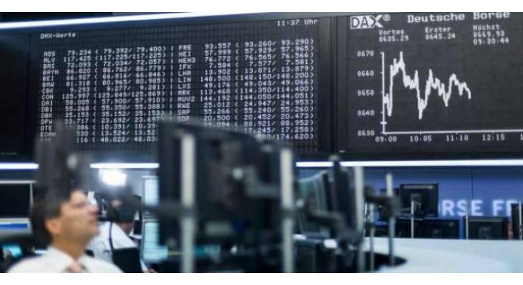 German shares lose 0.90 pct at start of trading
