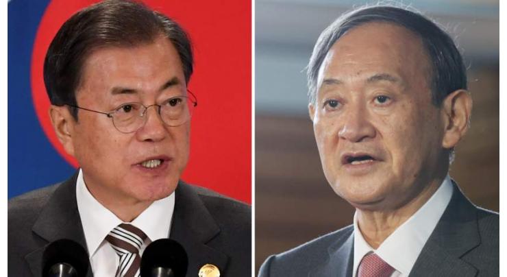 New Japan premier, S.Korea leader seek to mend ties
